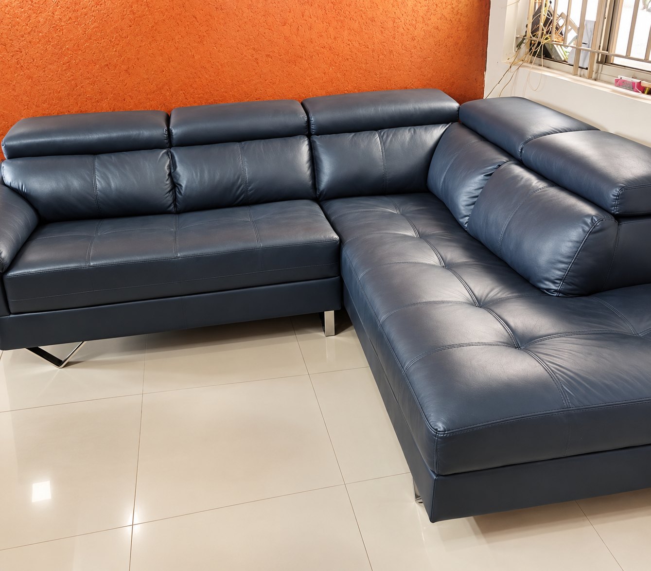 Leather L shape sofa after reupholstery by Kapital in Bangalore